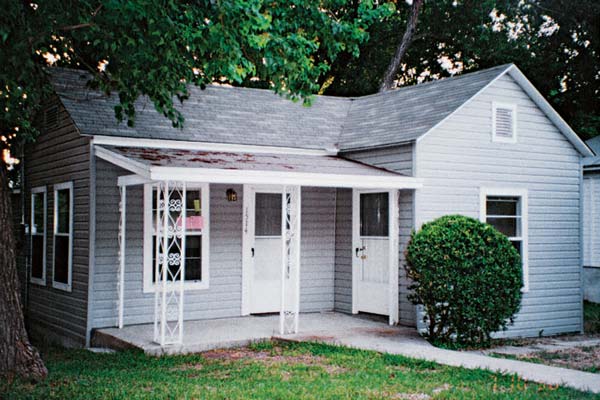 BEFORE: Greening this little house also provided an opportunity to improve its looks. What appears to be wood siding is actually 4-by-8-foot fiber-cement panels with caulked joints concealed by battens made from wood fiber and recycled plastic.